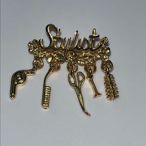 Gold tone Stylist Charm Brooch